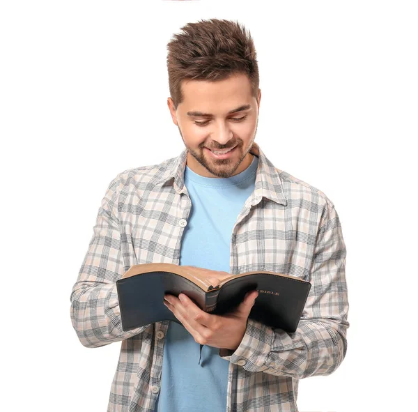 Junger Mann Liest Bibel Auf Weißem Hintergrund — Stockfoto