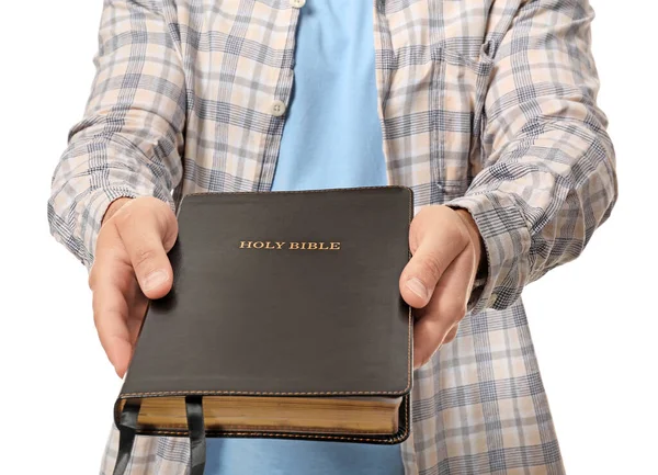 Joven Con Biblia Sobre Fondo Blanco Primer Plano —  Fotos de Stock