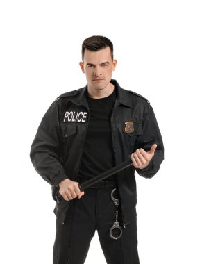 Aggressive police officer with baton on white background clipart
