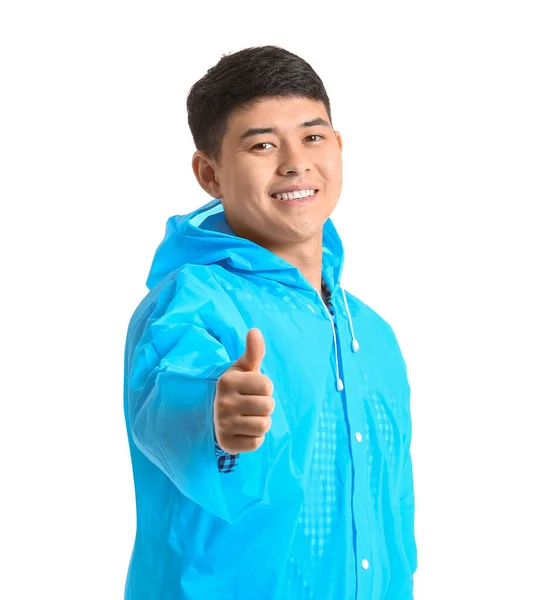 Young Asian Man Raincoat Showing Thumb White Background — Stock Photo, Image