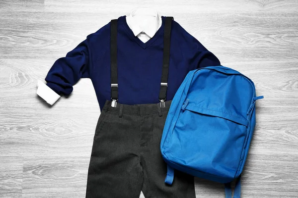 Stylish School Uniform Backpack Wooden Background — Stock Photo, Image