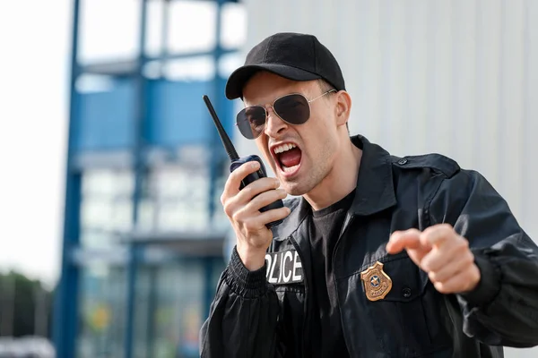 Aggressive Police Officer Two Way Radio Outdoors — Stock Photo, Image