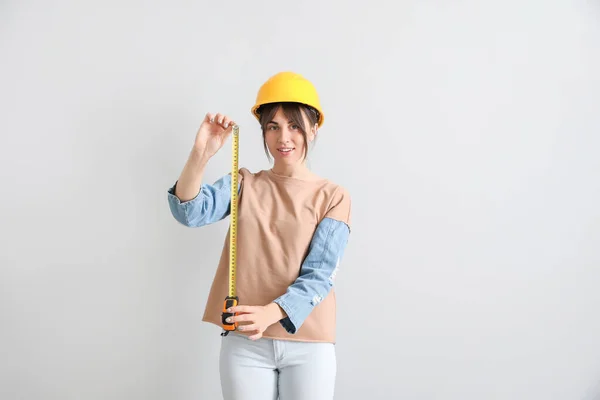 Young Woman Tape Measure Light Background — Stock Photo, Image