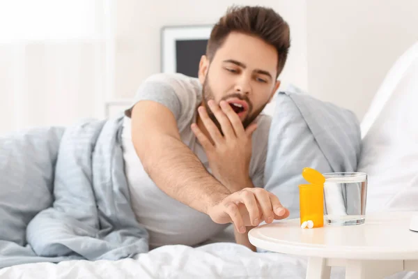 Man Taking Sleeping Pills Table Bedroom — Stock Photo, Image