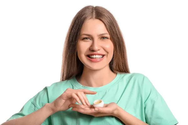 Schöne Junge Frau Mit Lippenbalsam Auf Weißem Hintergrund — Stockfoto