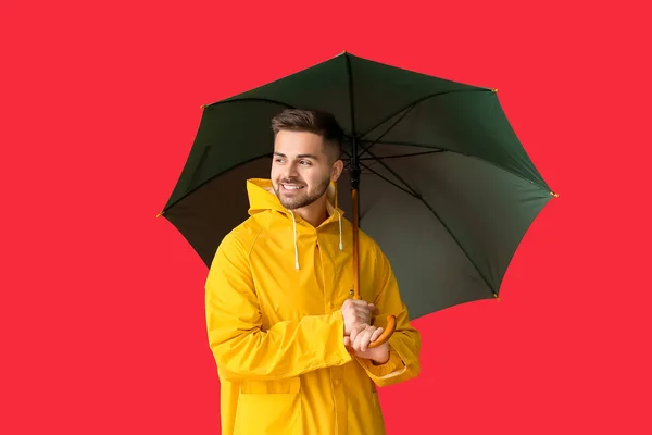 Young Man Raincoat Umbrella Color Background — Stock Photo, Image