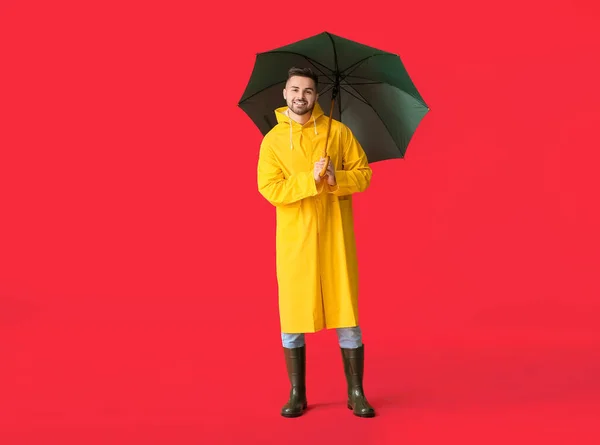 Young Man Raincoat Umbrella Color Background — Stock Photo, Image