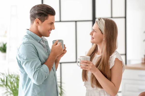 Happy Young Couple Drinking Tea Home — Stock Photo, Image