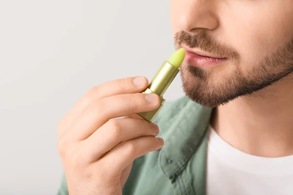 Handsome Young Man Lip Balm Light Background Closeup — Stock Photo, Image