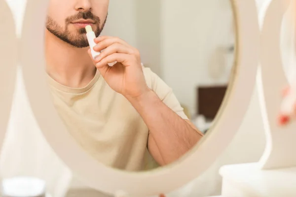 Handsome Young Man Applying Lip Balm Home — Stock Photo, Image