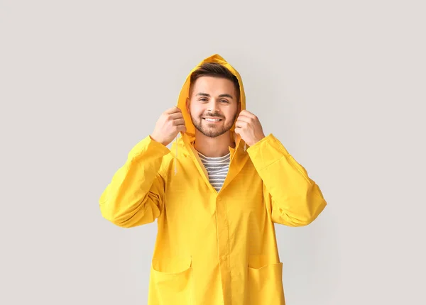 Young Man Raincoat Light Background — Stock Photo, Image