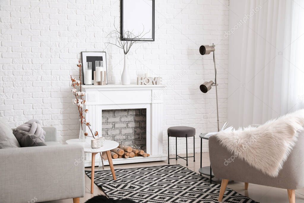 Stylish fireplace in interior of living room