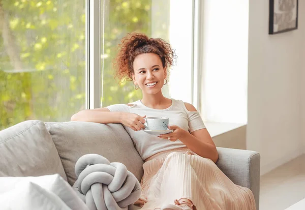 Beautiful Young African American Woman Drinking Hot Tea Home — Stock Photo, Image