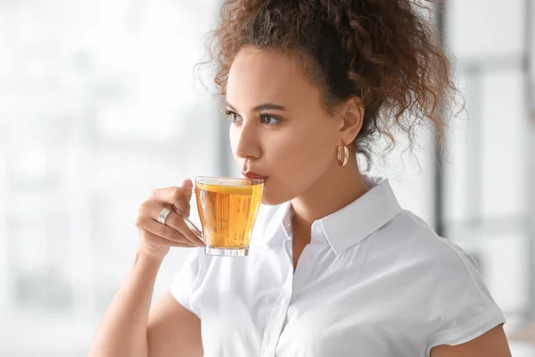 Beautiful Young African American Woman Drinking Hot Tea Home — Stock Photo, Image