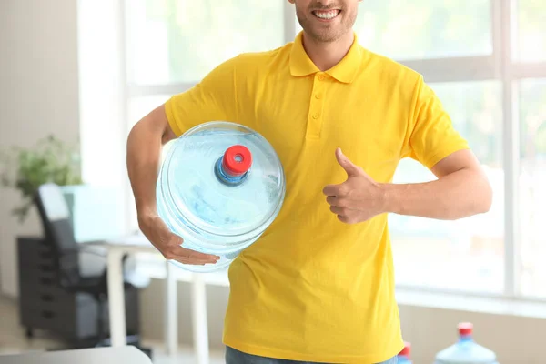 Delivery Man Bottle Water Showing Thumb Gesture Office — Stock Photo, Image