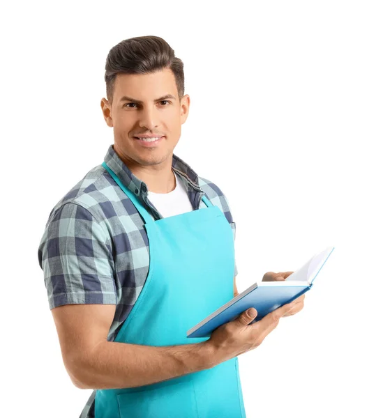 Junger Mann Mit Rezeptbuch Auf Weißem Hintergrund — Stockfoto