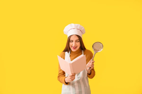 Young Woman Recipe Book Color Background — Stock Photo, Image