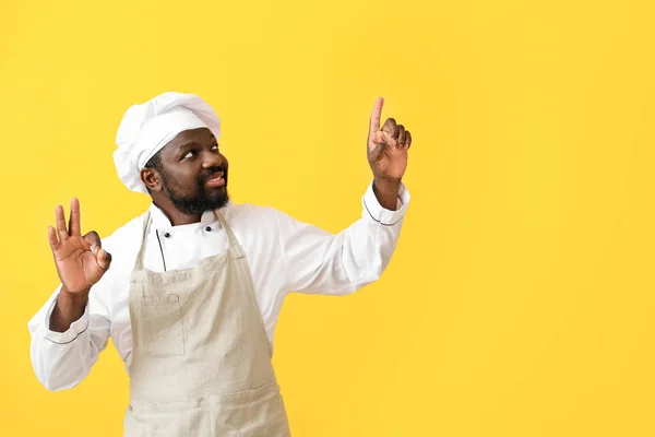 Male African American Chef Showing Color Background — Stock Photo, Image