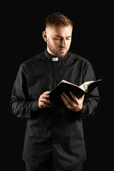 Young Priest Bible Dark Background — Stock Photo, Image