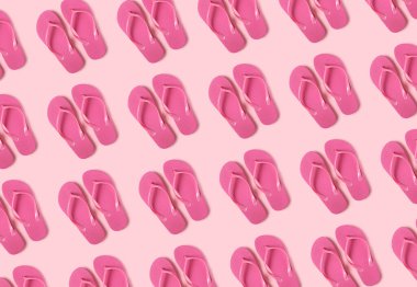 Renk arkaplanında birçok parmak arası terlik