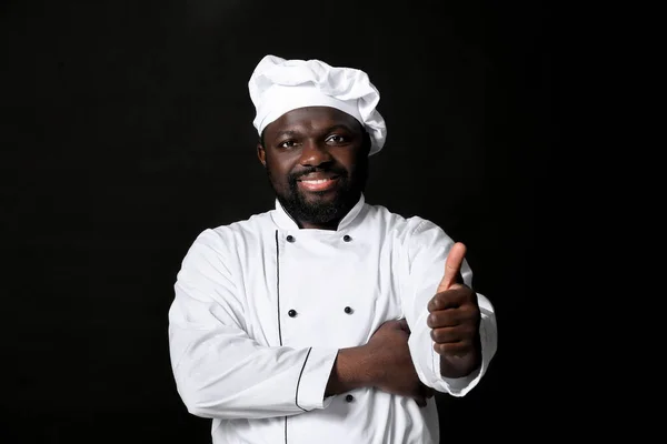 Male African American Chef Showing Thumb Dark Background — Stock Photo, Image