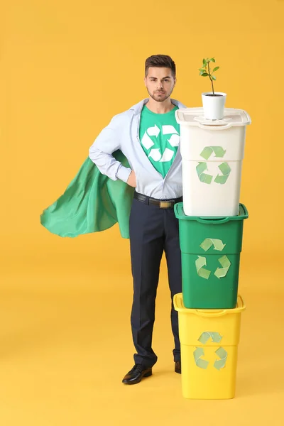 Man Dressed Eco Superhero Trash Bins Plant Color Background — Stock Photo, Image