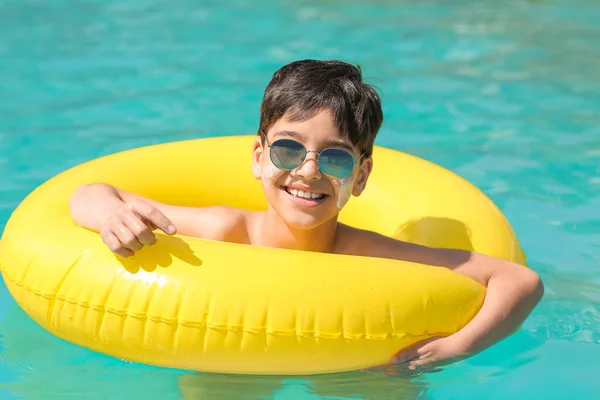 Little Boy Sun Protection Cream His Face Inflatable Ring Swimming — Stock Photo, Image