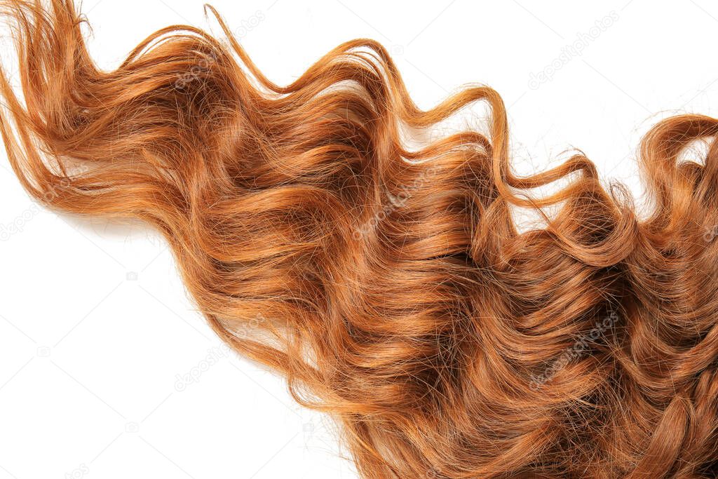 Curly red hair on white background