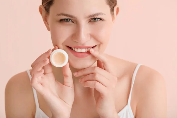 Beautiful Young Woman Lip Balm Color Background — Stock Photo, Image