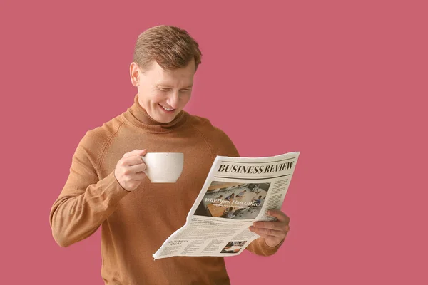 Handsome Man Cup Tea Newspaper Color Background — Stock Photo, Image