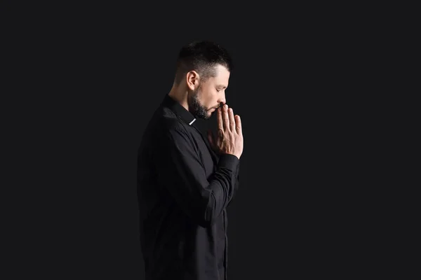 Handsome Praying Priest Dark Background — Stock Photo, Image