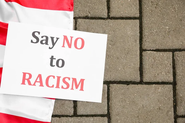 Paper Text Say Racism Flag Usa Outdoors — Stock Photo, Image