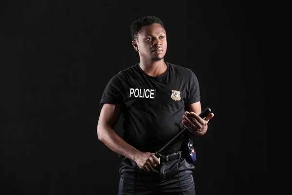 African American Police Officer Baton Dark Background — Stock Photo, Image