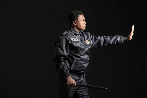 African American Police Officer Baton Dark Background — Stock Photo, Image