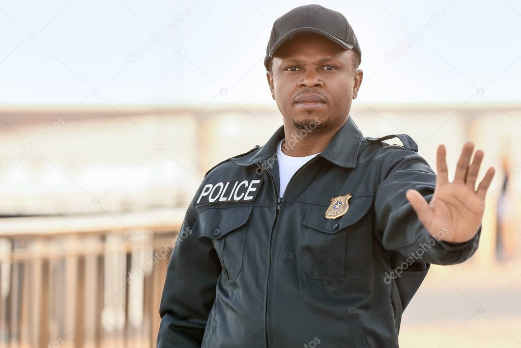 African-American police officer in the street