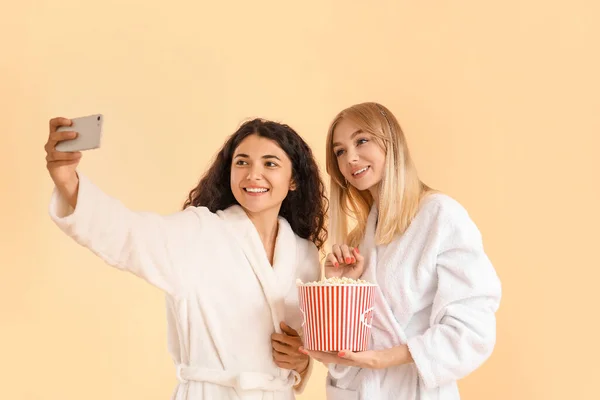 Beautiful Young Women Bathrobes Taking Selfie Color Background — Stock Photo, Image
