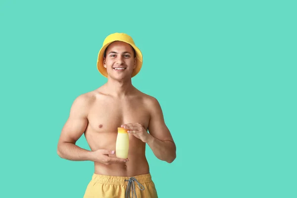 Happy Young Man Sun Protection Cream Color Background — Stock Photo, Image
