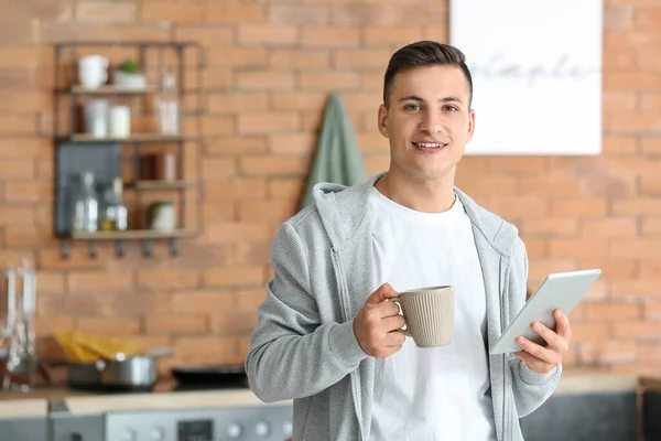 Handsome Young Man Tablet Drinking Tea Home — Stock Photo, Image