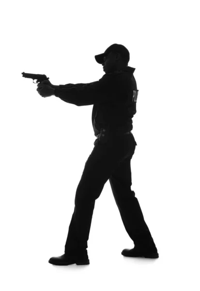 Silhouet Van Agressieve Afro Amerikaanse Politieagent Met Pistool Witte Achtergrond — Stockfoto