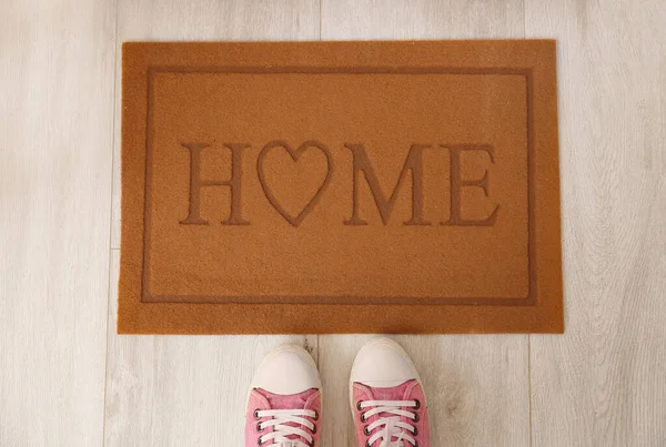 Woman Standing Door Mat Floor Hallway — Stock Photo, Image