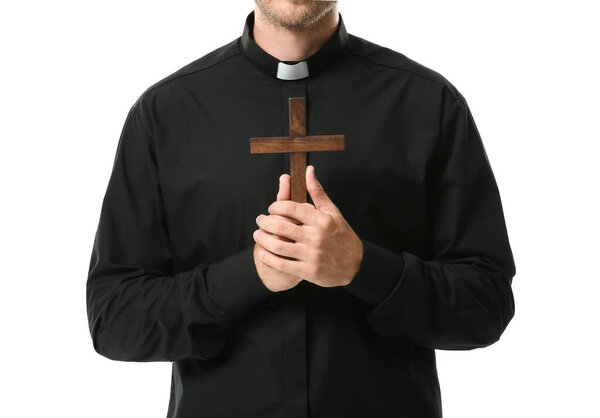Male priest with cross on white background