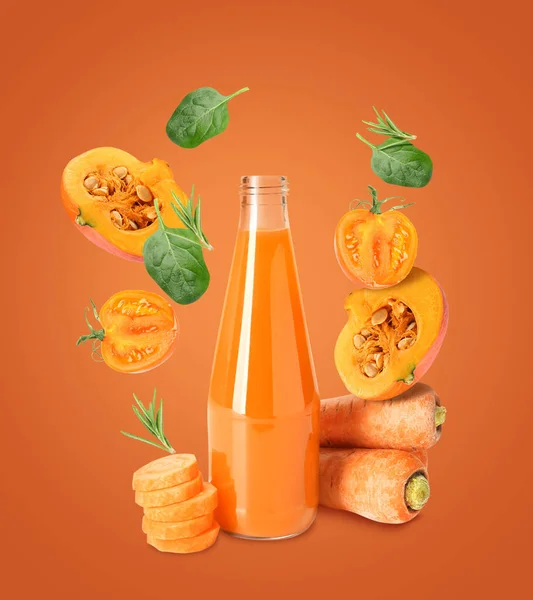 Bottle of fresh vegetable juice and flying ingredients on color background