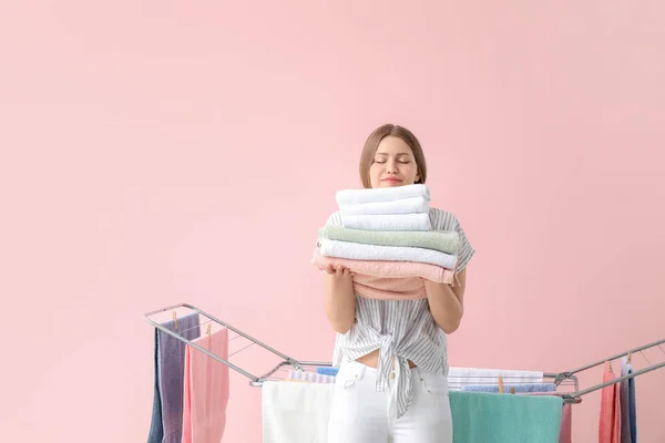 Woman Hanging Clean Towels Dryer Color Background — Stock Photo, Image