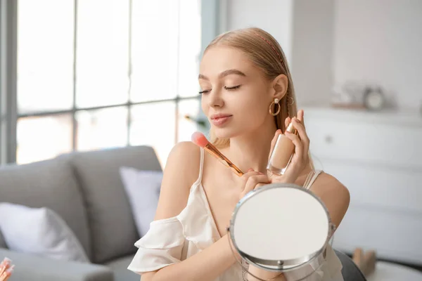 Beautiful Young Woman Applying Foundation Home — Stock Photo, Image