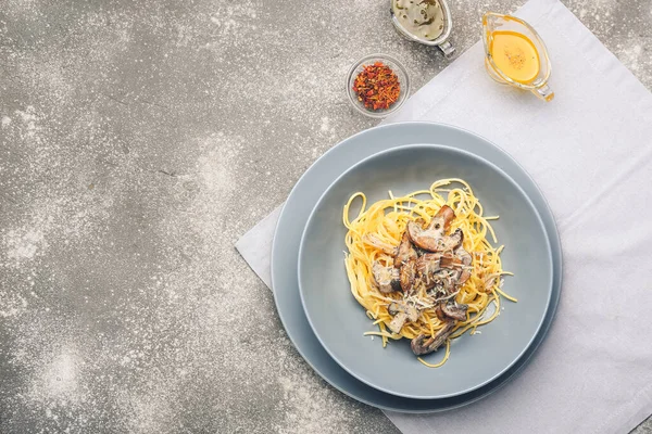 Plate Tasty Pasta Mushrooms Grey Background — Stock Photo, Image