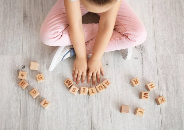 Little Girl Autistic Disorder Playing Cubes Floor Top View — Stock Photo, Image