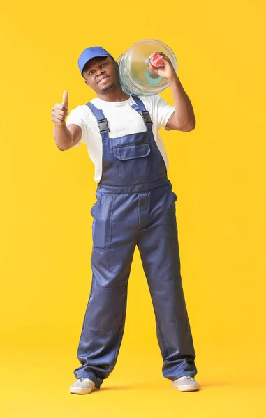 African American Delivery Man Bottle Water Showing Thumb Gesture Color — Stock Photo, Image