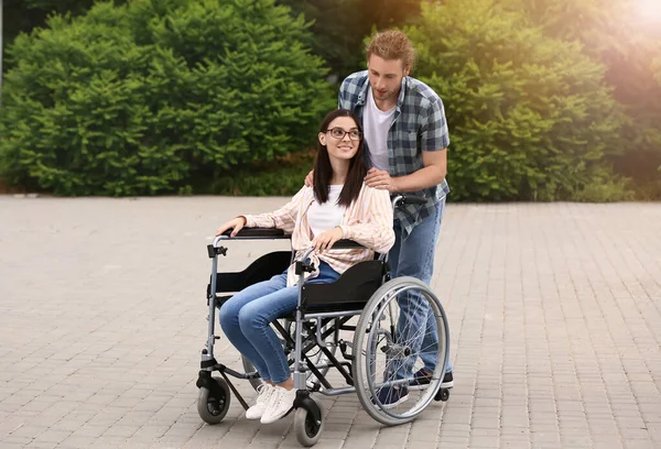 Young Man His Wife Wheelchair Outdoors — Stock Photo, Image