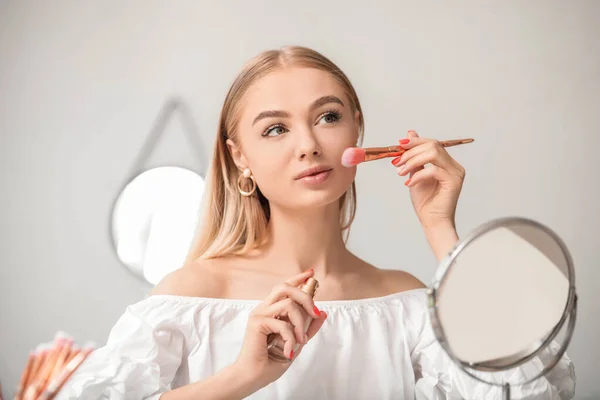 Beautiful Young Woman Applying Foundation Home — Stock Photo, Image