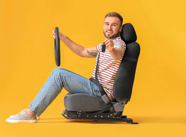 Young Man Steering Wheel Key Sitting Car Seat Color Background — Stock Photo, Image